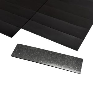 a black rectangular object next to a black rectangular object